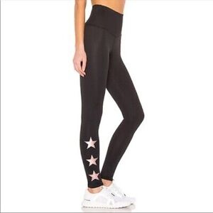 Strut this x revolve star ankle leggings